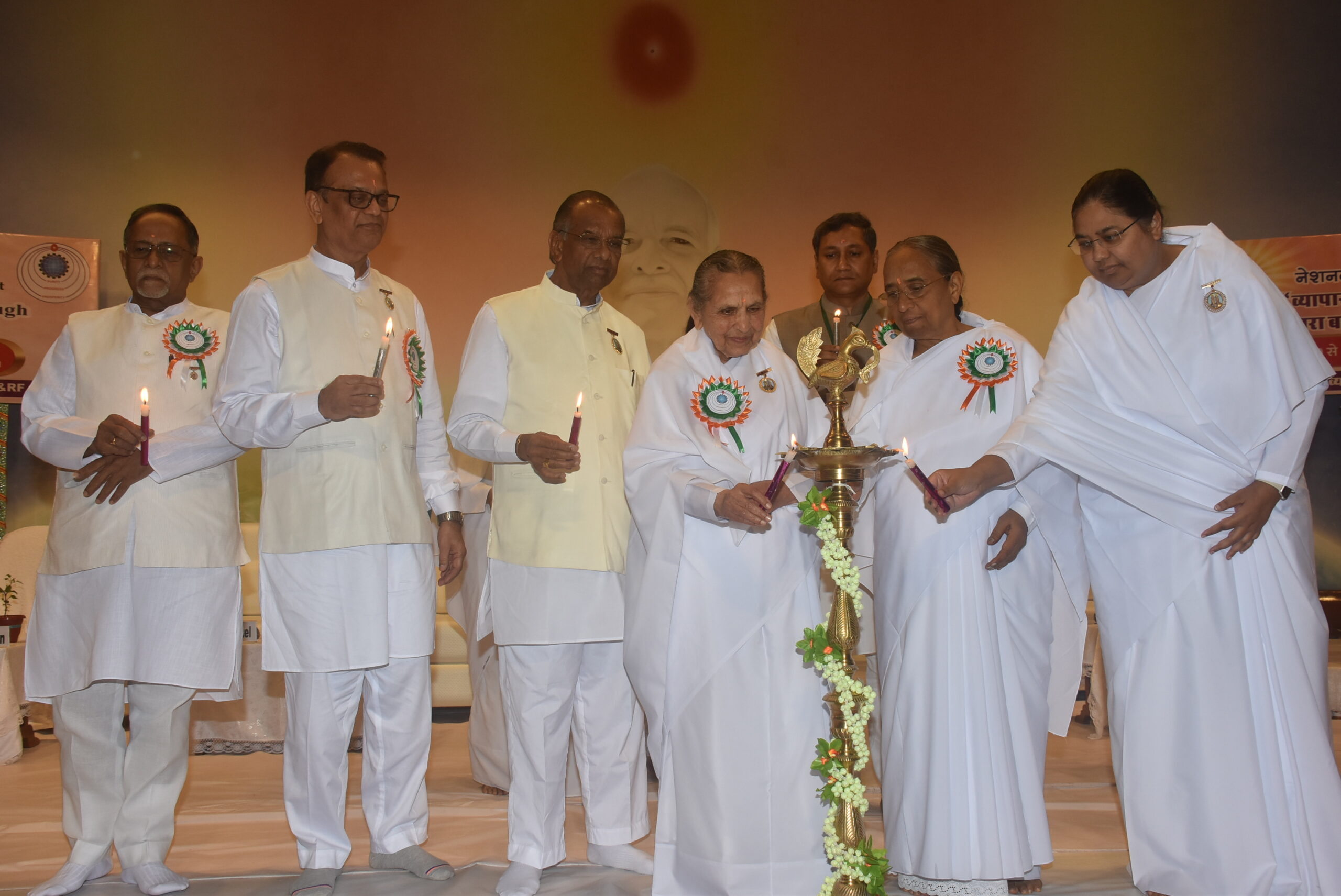 Lighting the lamps during the inaugural session of the conference