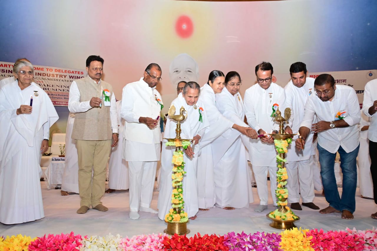 Lighting the lamps during the inaugural session of the conference